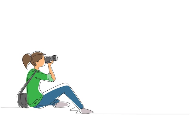 Single one line drawing woman photographer of paparazzi taking photo with digital camera vector