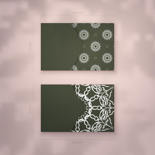 Sjabloon voor visitekaartjes in donkergroene kleur met vintage wit patroon voor uw bedrijf.