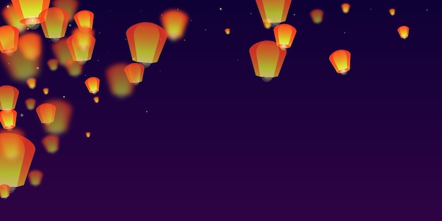 Sky lanterns floating in the night sky
