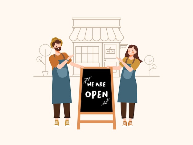 small business owners stand to greet buyers with we are open blackboard sign