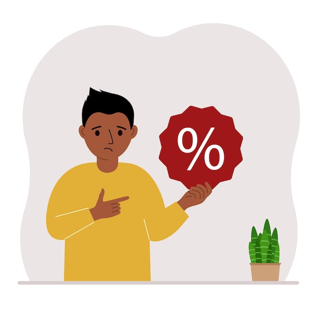 A small child holds a percent sign in his hand The concept of percentage discount promotion for training or shopping