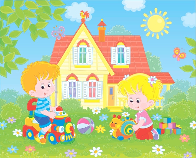 Small children playing with toys among flowers on green grass of a front lawn of their house