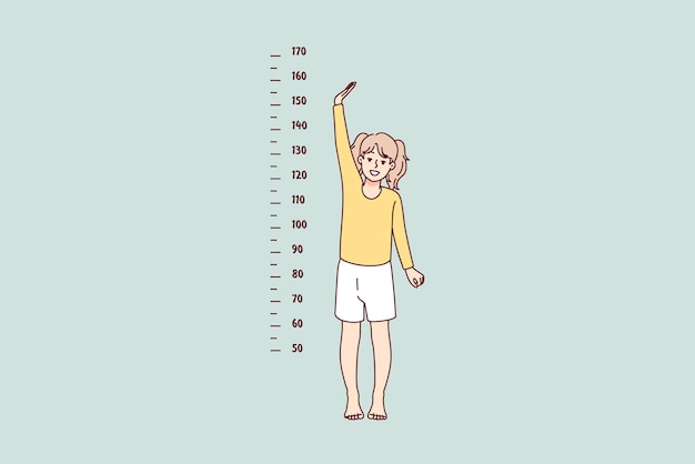 Small girl show height on measurement