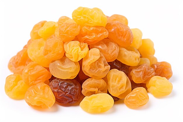 Small pile of dried apricots isolated on the white background yellow sultanas raisins isolated