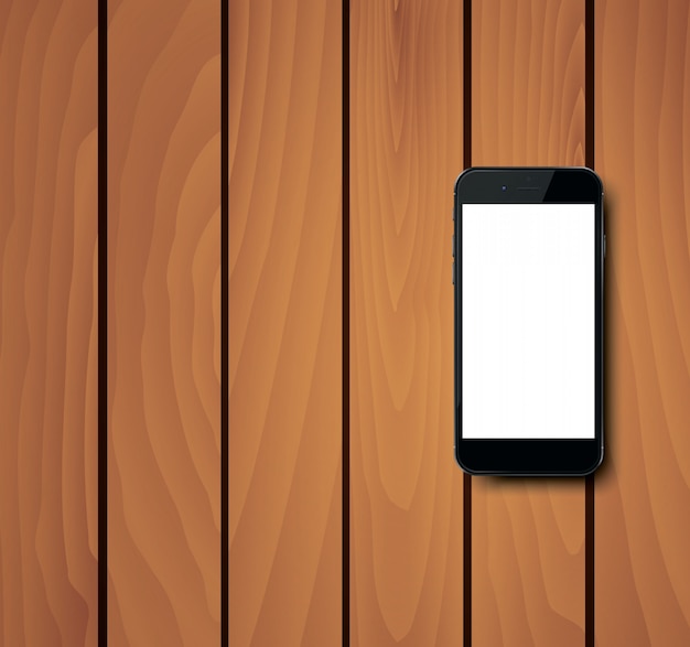 Smart phone on wooden background.