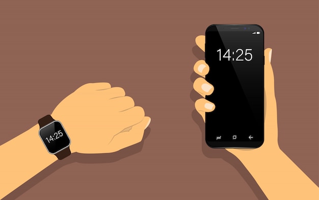 Smart watch a portata di mano e smartphone in mano.