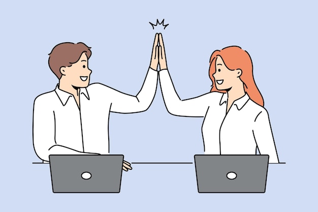 Smiling colleagues give high five working together