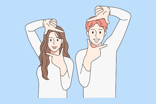 Smiling couple make frame gesture with hands