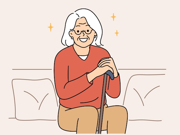 Smiling elderly grandmother sit on sofa