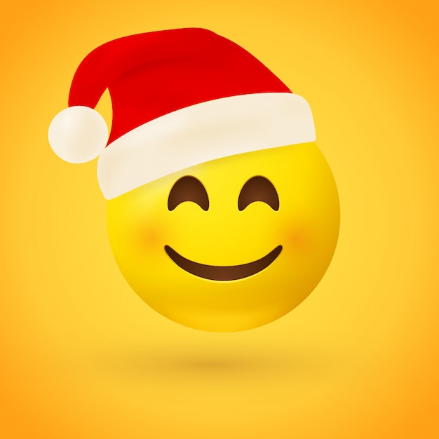 A smiling face emoji with red Santa hat