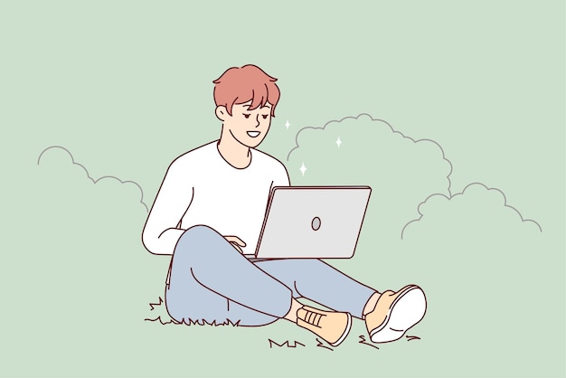 Smiling guy sit outdoors work on computer