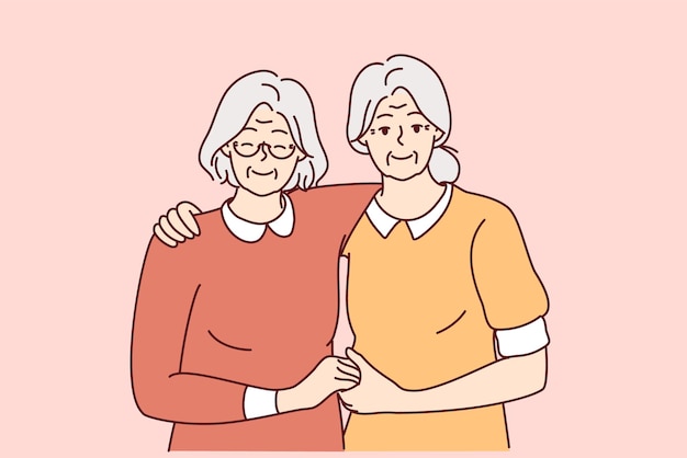 Smiling mature women hugging