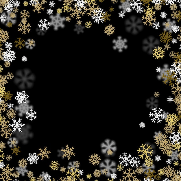 Snowfall background with golden snowflakes blurred in the dark