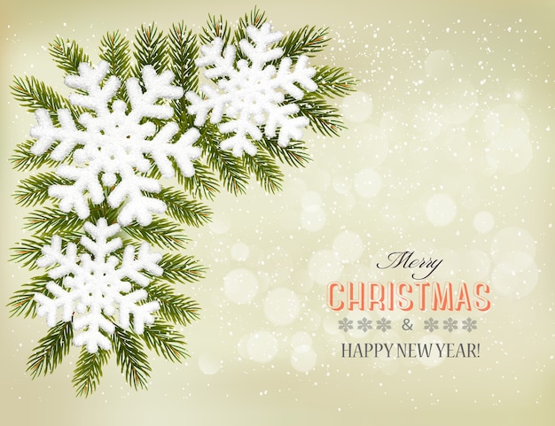 Snowflakes on christmas tree branches. Christmas holiday background.
