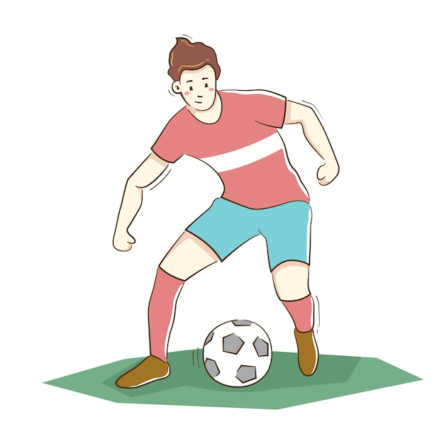 Футболист бьет по мячу на белом