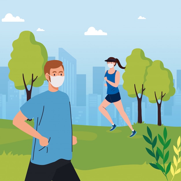 Social distancing between man and woman with masks running at park