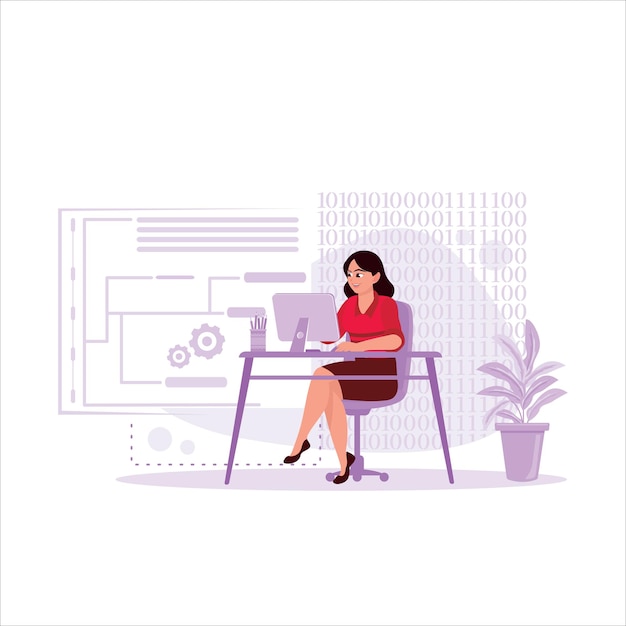 Softwareontwikkelaarsconcept Een vrouwelijke werknemer werkt op een computer op kantoor