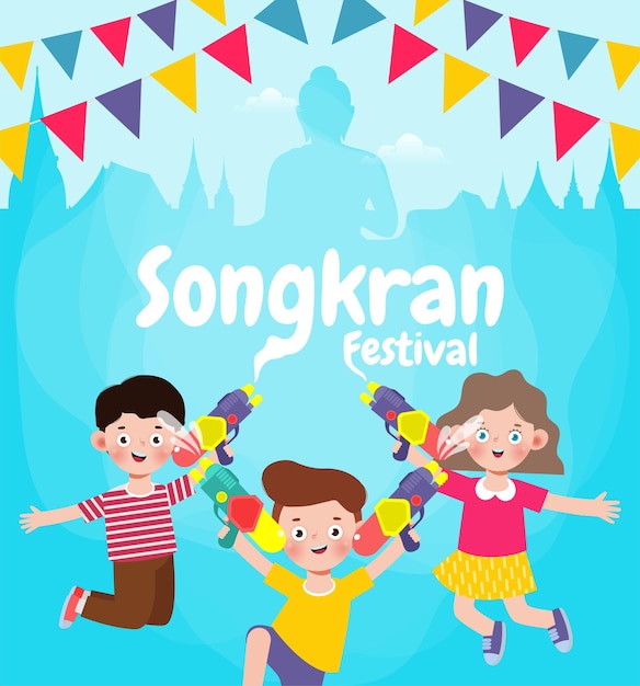 I bambini del festival di songkran che tengono in mano una pistola ad acqua e saltano si divertono a spruzzare acqua a songkran, in thailandia