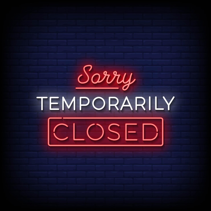 Vector sorry temporarily closed neon sign on brick wall background
