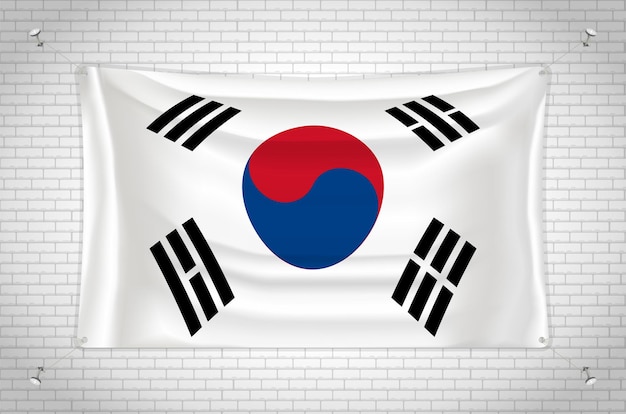 Bandiera della corea del sud appesa al muro di mattoni. disegno 3d. bandiera attaccata al muro.