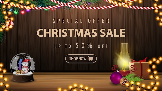 Special offer, Christmas sale, up to 50% off, beautiful discount banner with Christmas decor. Postcard with a cozy interior