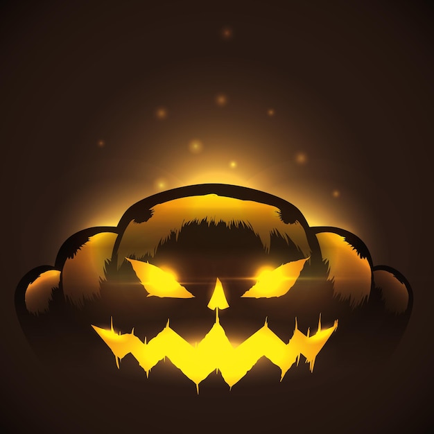 Spooky pumpkin shining on dark background in a halloween night