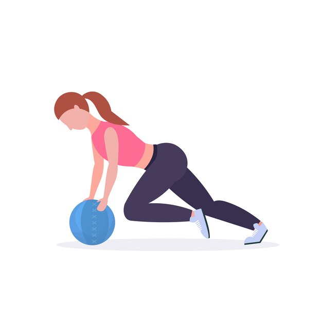 Sporty woman doing crossfit exercises with medicine leather ball girl training in gym cardio workout healthy lifestyle concept  white background full length