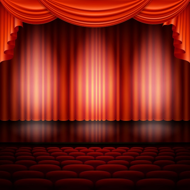 Spotlight on stage and red curtain.  