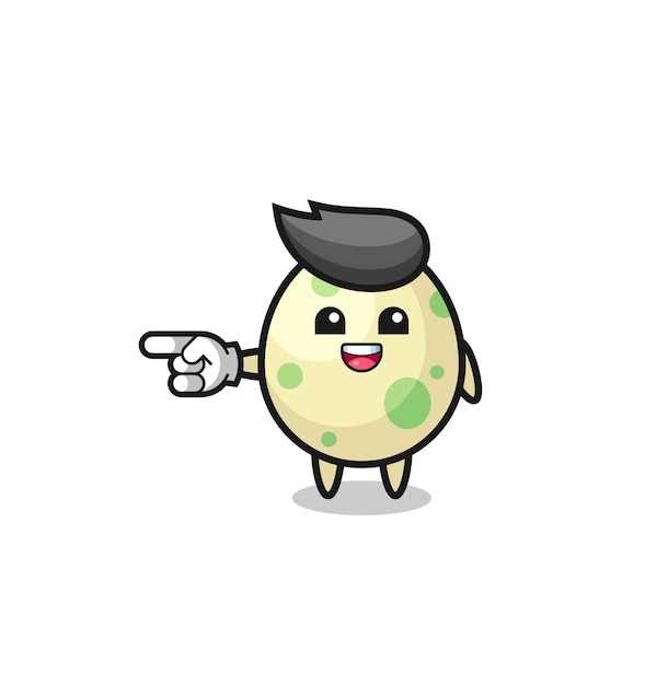 Spotted egg cartoon with pointing left gesture cute design