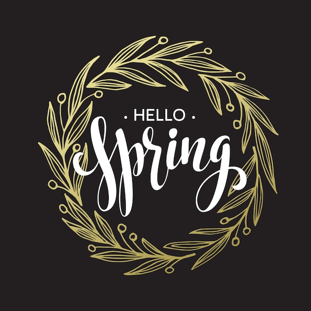 Spring handwritten calligraphy, black brushpen lettering phrase hello spring  in golden wreath frame