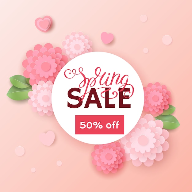 Insegna di vendita della primavera con il testo tipografico calligrafico dell'iscrizione con i fiori di carta variopinti. sconto del 50% sullo sfondo.