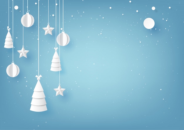 Stars,christmas trees and christmas ball hanging on blue sky winter season background.