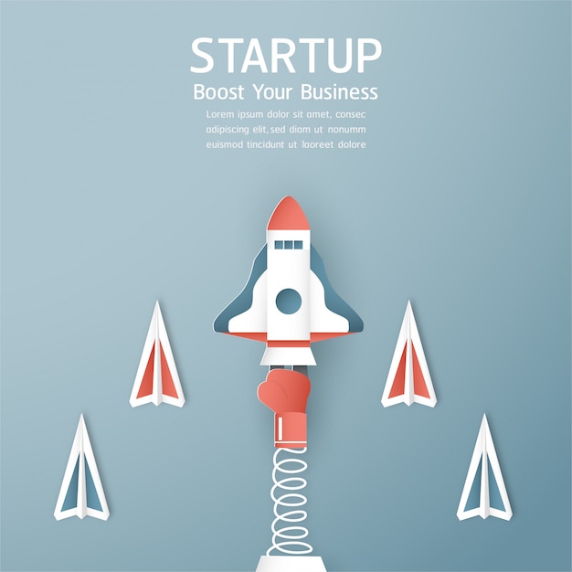 Start up concept in paper cut, craft and origami style. rocket is flying on blue sky.