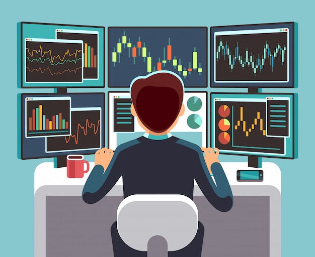 Stock market trader looking at multiple computer screens with financial and market charts.