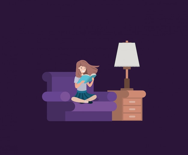 student girl sitting reading book in livingroom