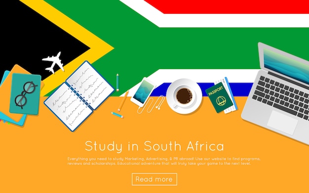 Studia in sud africa il concetto per il tuo banner web o materiali di stampa. vista dall'alto di un computer portatile, libri e tazza di caffè sulla bandiera nazionale. intestazione del sito web di studio stile piatto all'estero