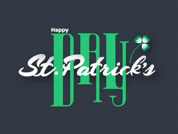 Stylish Creative Text of Happy St. Patrick's Day with Shamrock Leaf on Grey .