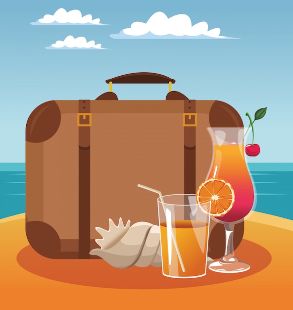 Suitcase and juice cup with cocktail 