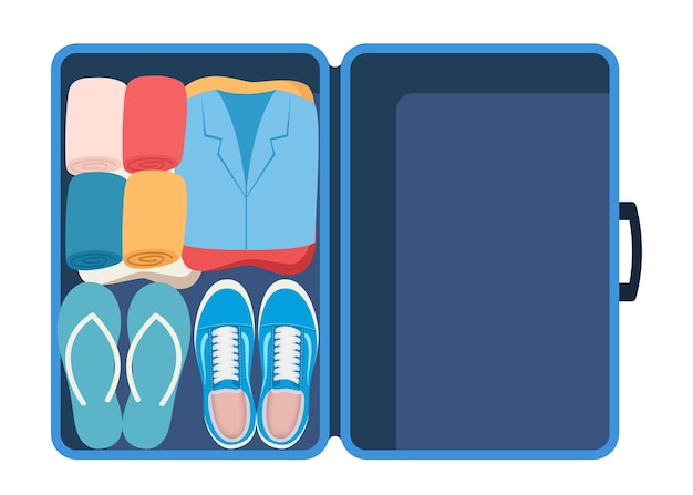Suitcase with packed clothes for travel in top view Clothing footwear
