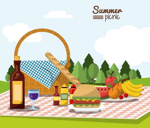 風景とピクニックバスケット付きの夏のピクニック