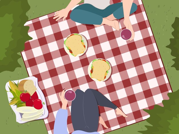 Picnic estivo con persone e cestino con cibo