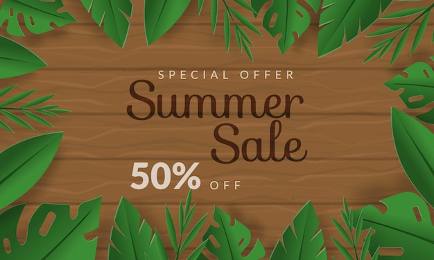 summer sale banner with tropicla leaf on wood background