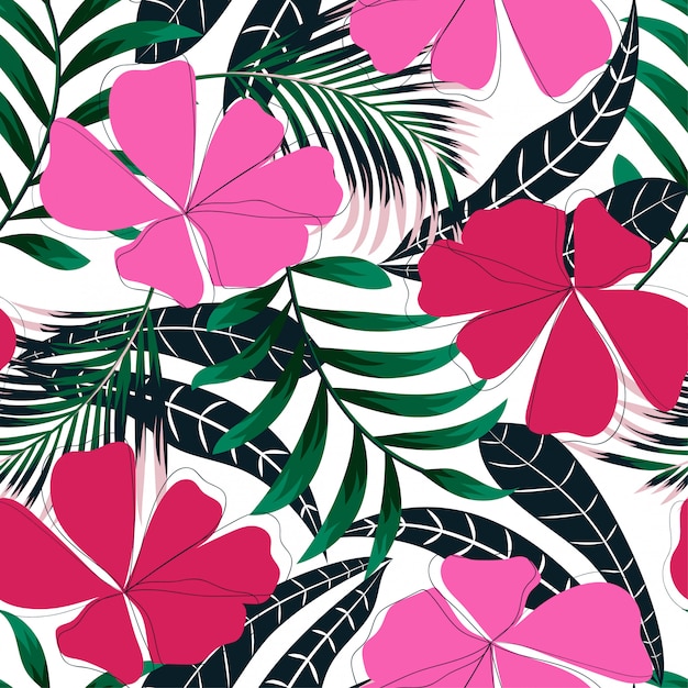 Summer trend seamless background with bright tropical leaves and flowers