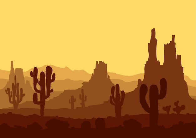 Sunset in stone desert with cactuses and mountains