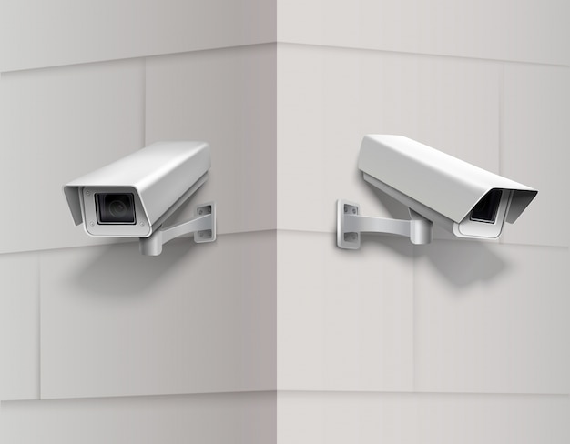 Surveillance cameras on wall