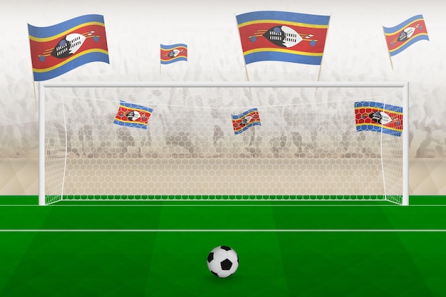 Swaziland football team fans with flags of Swaziland cheering on stadium penalty kick concept in a soccer match