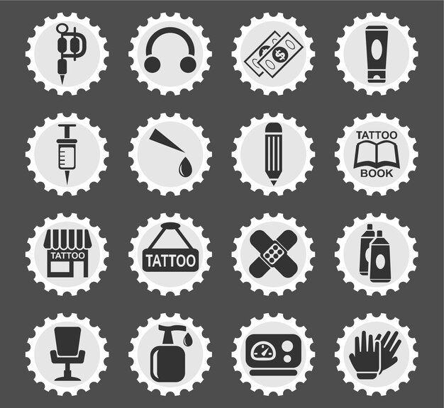 Vector tattoo salon icons on stylized round postage stamps