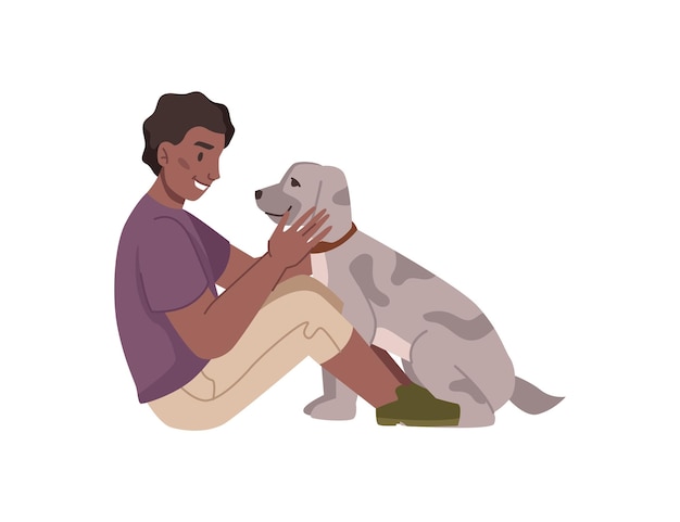 Teenage boy playing with dog child with puppy