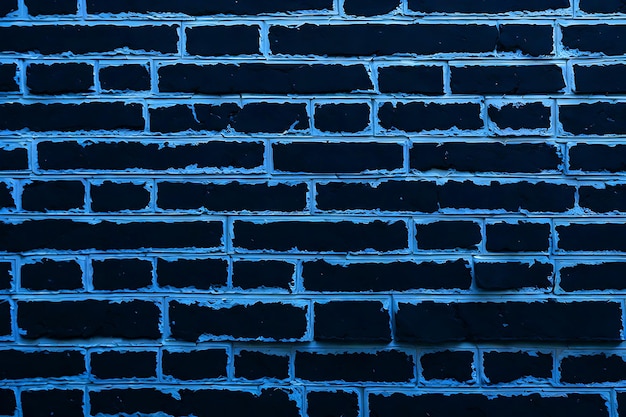 The texture of a blackpainted brick wall as a background or wallpaper