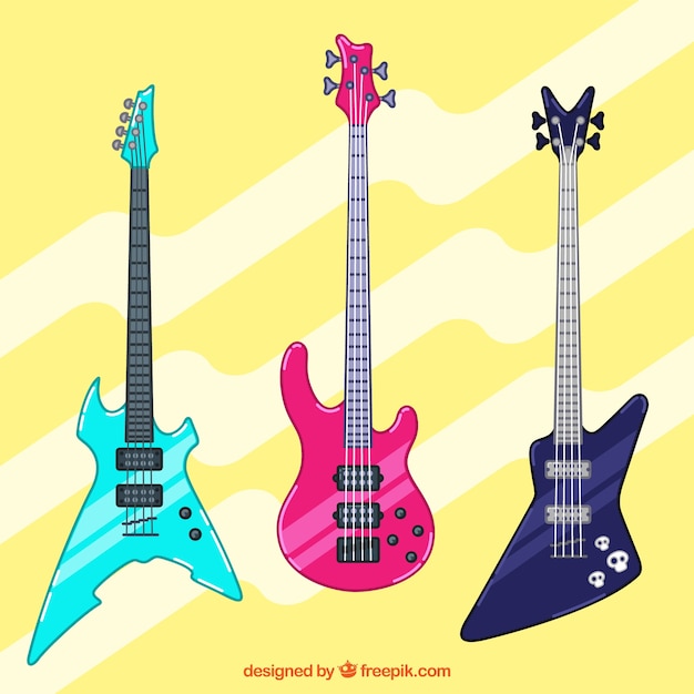 Tre basse chitarre con grandi colori e disegni
